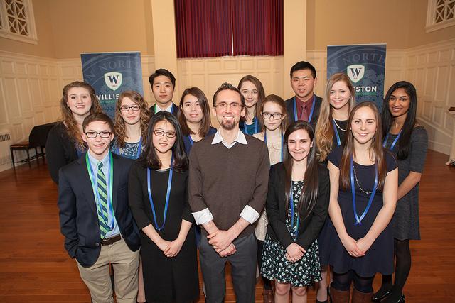 The inductees stand with Cum Laude speaker, Mark Franczyk ’00. From left to right they are: Mackenzie Possee, Cade Zawacki, Emily Peirent, Rae Kim, Tina Zhang, Umi Keezing, Mark Franczyk, Cameron Hill, Emma Kaisla, Loren Po, Katie Murray, Emily Grussing, Maisy Glick, Lena Gandevia. 