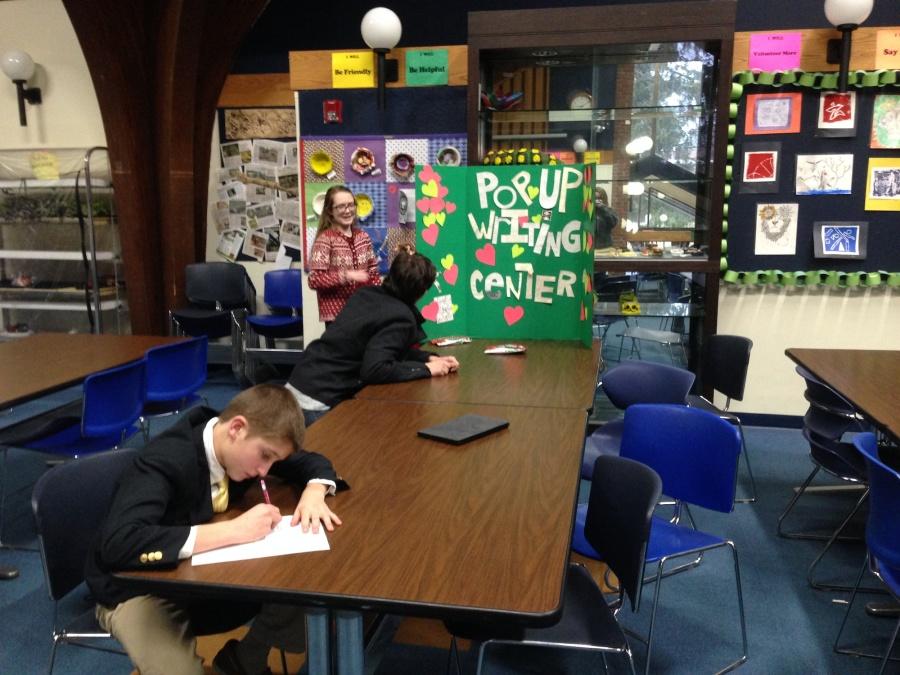 Writing center tutors Emma Kaisla '15 and Noah Jackson '15 visiting the Middle School in December.