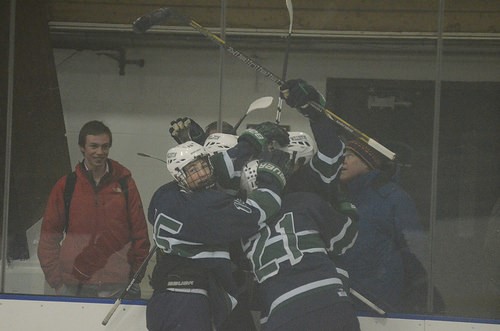The team celebrating in its recent win over Loomis. 