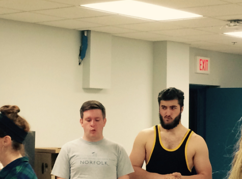 Evan Cavanaugh '15 and Mr. Joshua Harper prepare in the studio theatre.