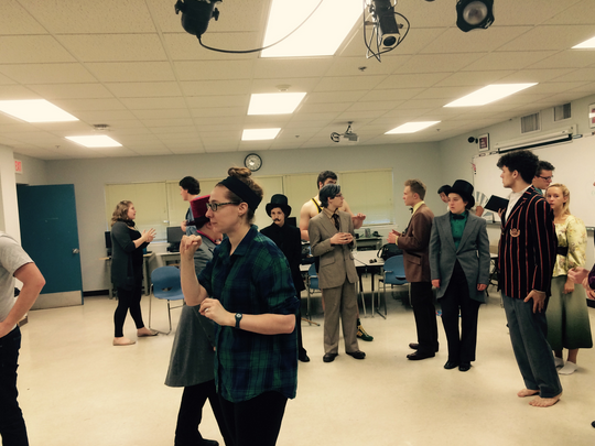 The cast prepares in the studio theatre.