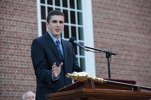 2014-15 Senior Class President Emmett O’Malley speaking at Convocation. Photo courtesy of Williston Flickr via Mathew Cavanaugh
 
