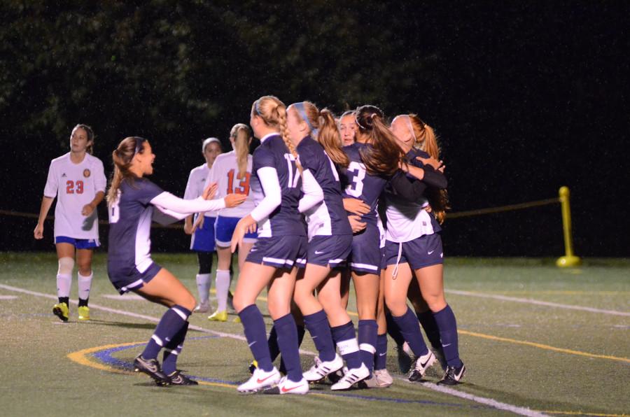 The GV Soccer team celebrates during its 3-0 victory over rival WMA on Friday night under the lights. Courtesy of Olivia Cuevas '16
