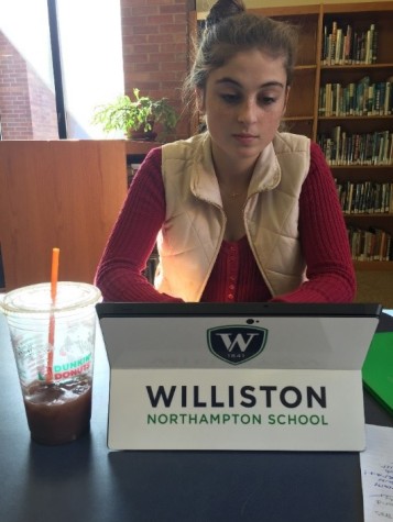 Emma Reynolds ’17 doing her homework on the Windows Surface Pro given to every member of the faculty and student body at the beginning of the school year. 