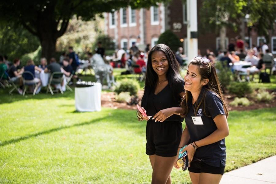 Suzy Abreu 16, a proctor in Mem. East, with Zoya Jade 16 at the 2015 Welcome Day.