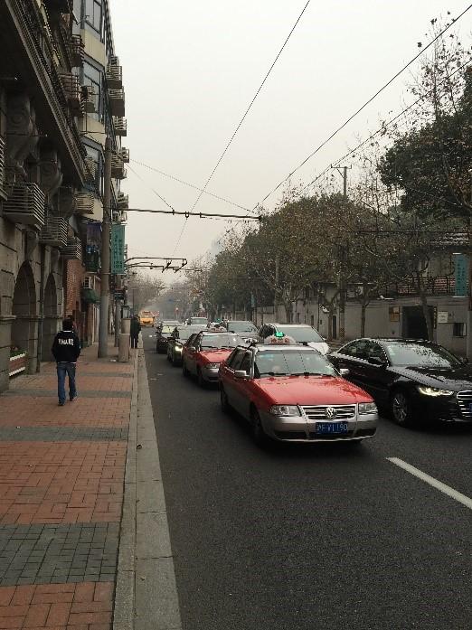A street in Shanghai. China, along with those of other advanced countries such as the US and Great Britain, emits large amounts of carbon dioxide and other toxic industrial wastes each year.