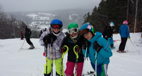 Lizzie Warncke '16, Arden Bacon '21 and Molly Solan '19 at the start of the Slalom race.