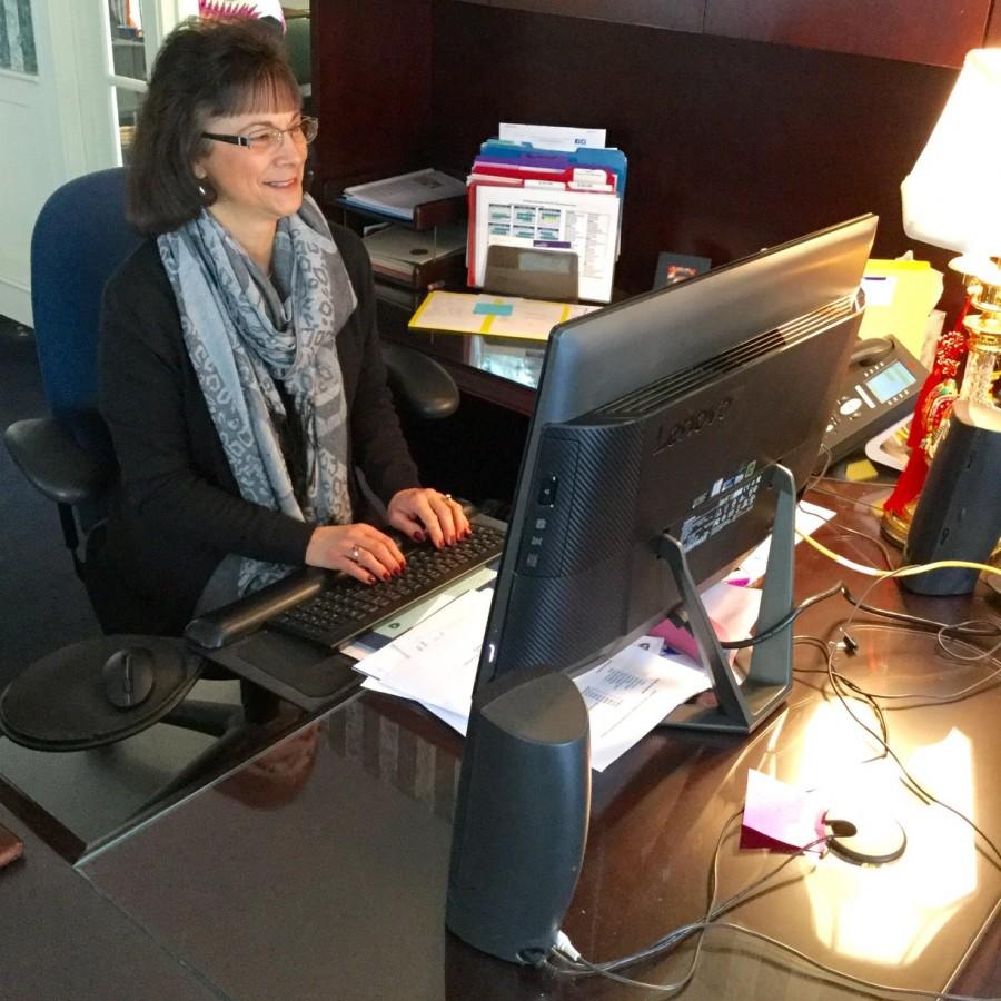 Mrs. Dietz working away in the Admissions Office.
