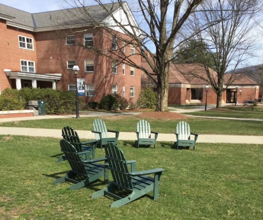 The green lawn chairs after being placed on the lawn of Memorial Hall.