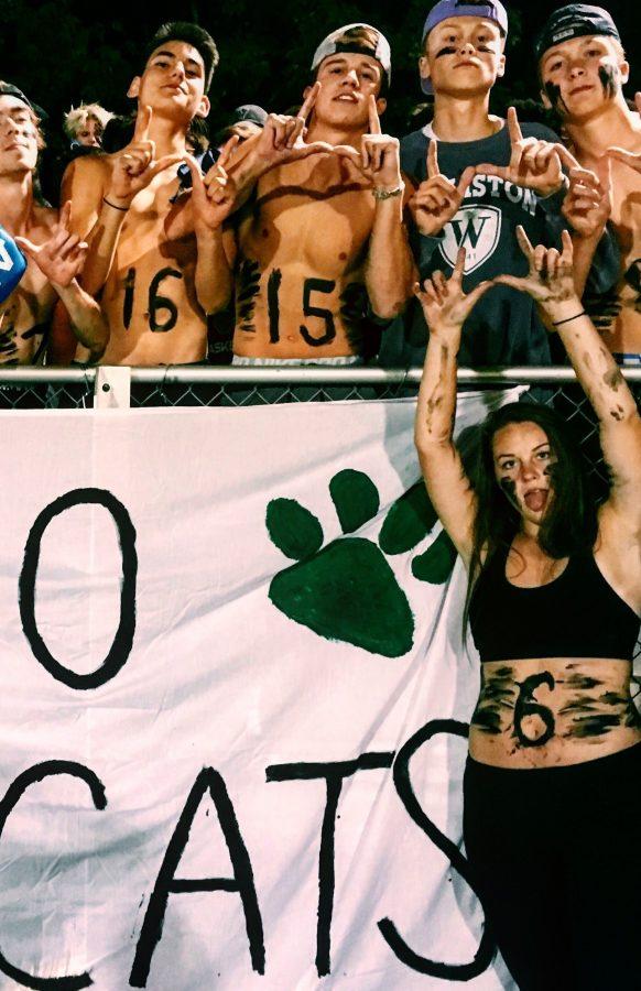 The Wildest Cats turn out on a warm night for the year's first football game under the lights at Sawyer Field.

Credit: Leah Pezanowski