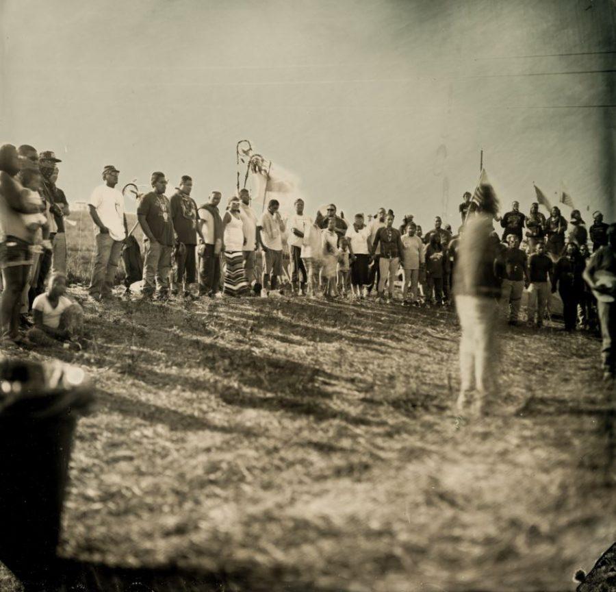 A tribe elder addresses protesters blocking the pipeline
