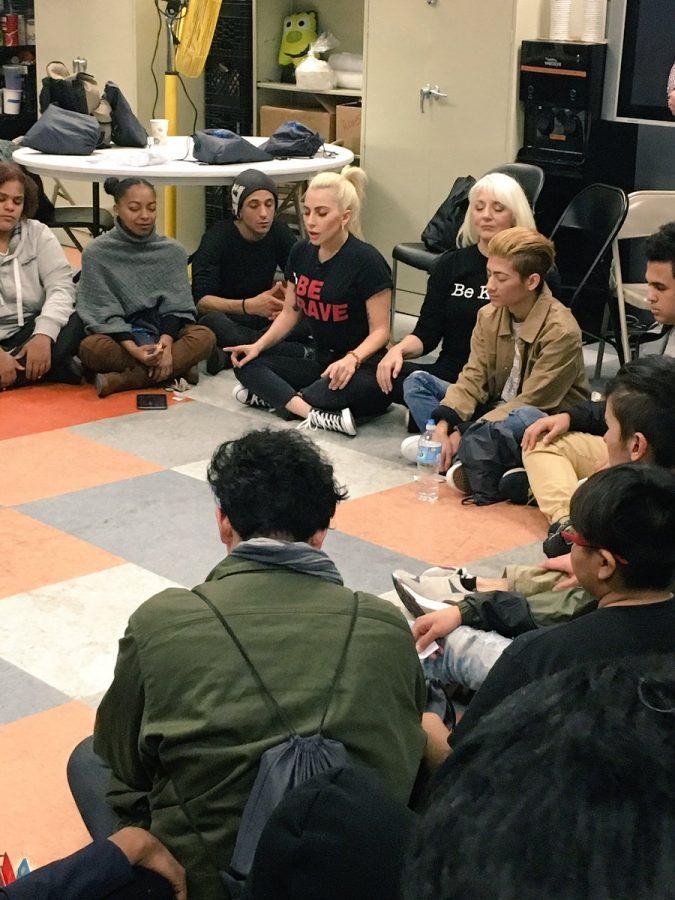 Lady Gaga with teens at a homeless shelter for LGBT youth in New York City. 
Credit: Twitter