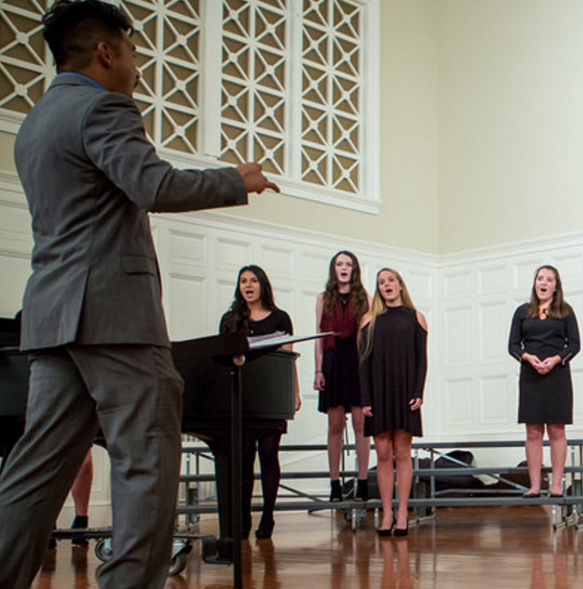 The Widdigers, directed by Mr. Berlanga, singing in the fall choral concert. Credit: Williston Flickr
