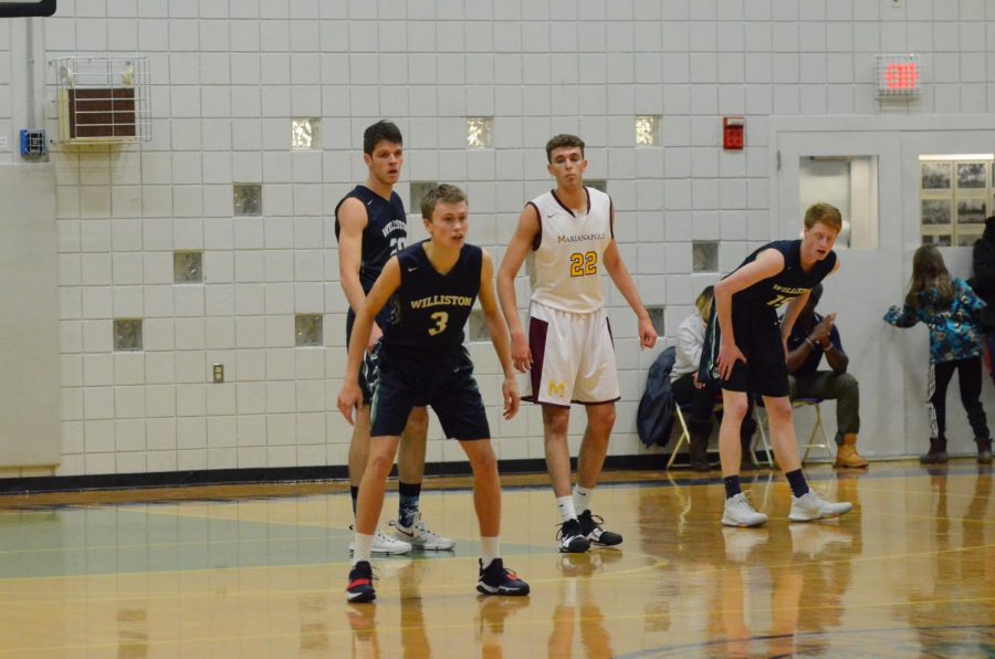 Boys Basketball Team Shoots and Scores a 4-0 Record