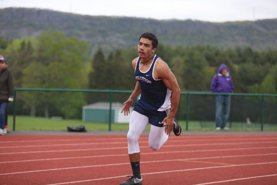 Track Team Sprints, Jumps Into Record Books